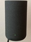 The front of one speaker. Behind the fabric is a tweeter, woofer, and dual passive radiators, click to load a larger version