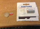 i keep the old one stored IN the adapter and this one stored in the open space in the case it came with., click to load a larger version