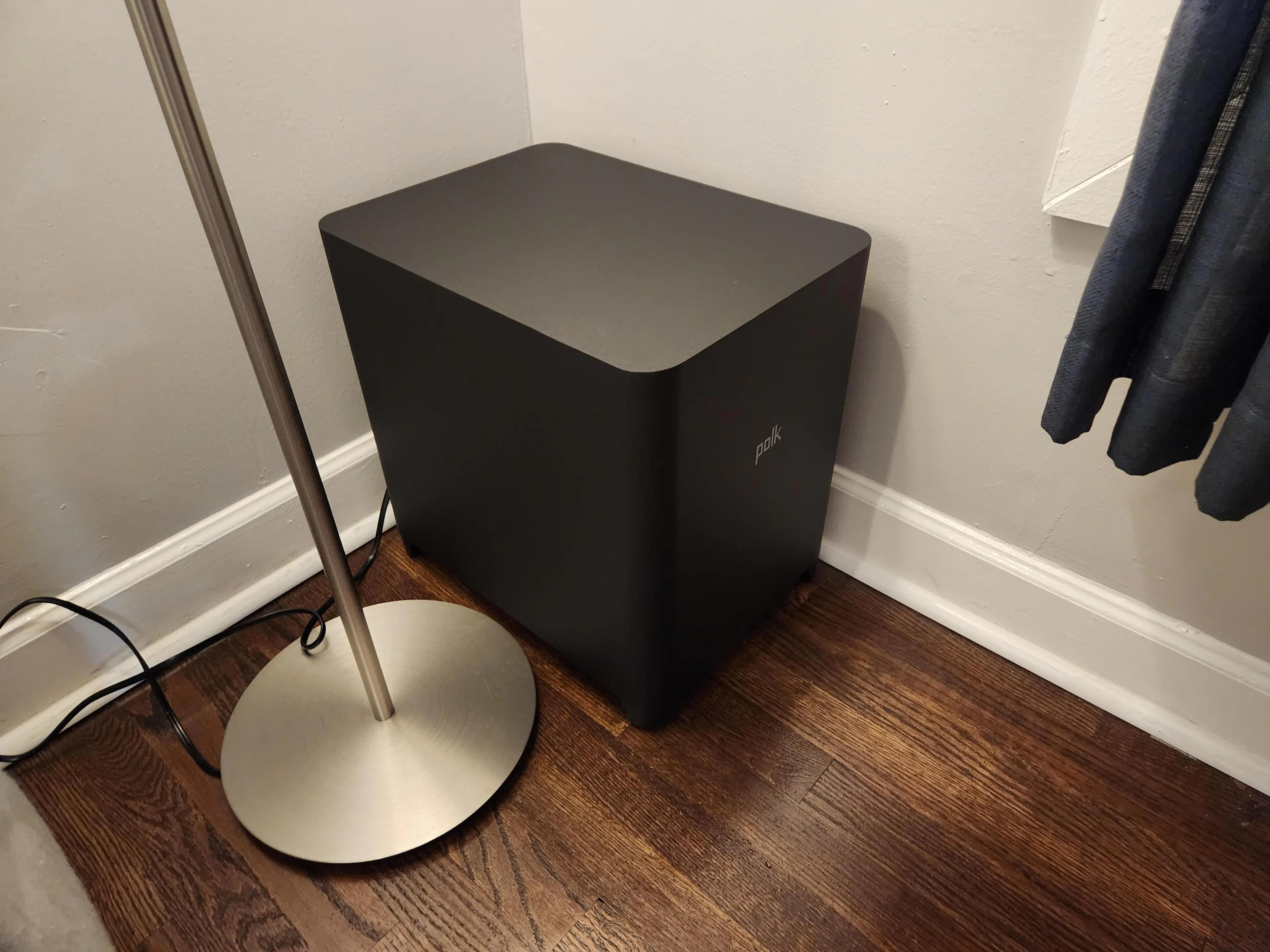 The subwoofer should be in a corner of your viewing room, not in the center next to the TV. Use your room's acoustics to make the most of your speakers!, click to load a larger version