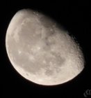Moon shot with zoom no tripod, click to load a larger version
