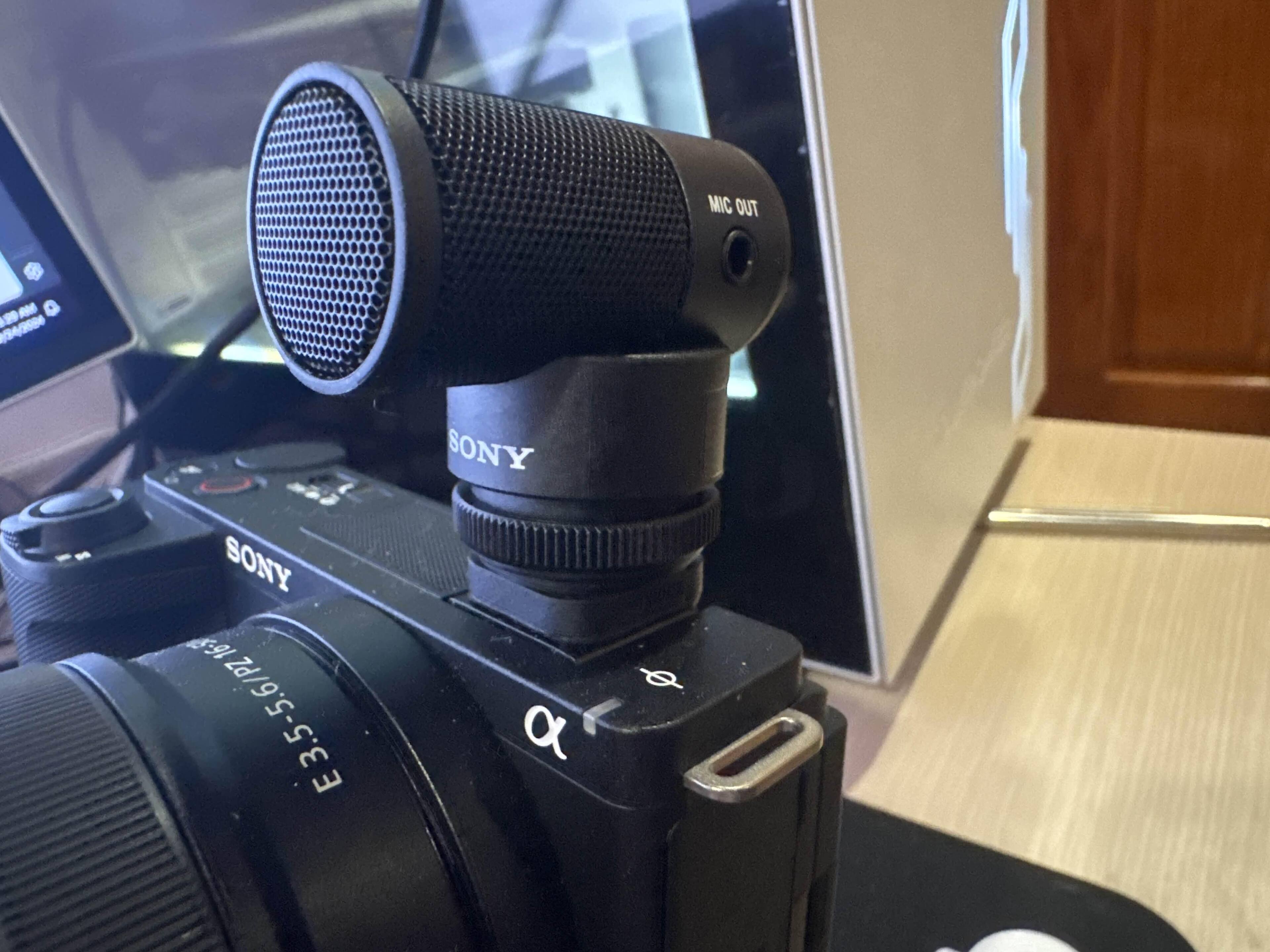 Shotgun mic without the sock, mic out port for use with other cameras., click to load a larger version