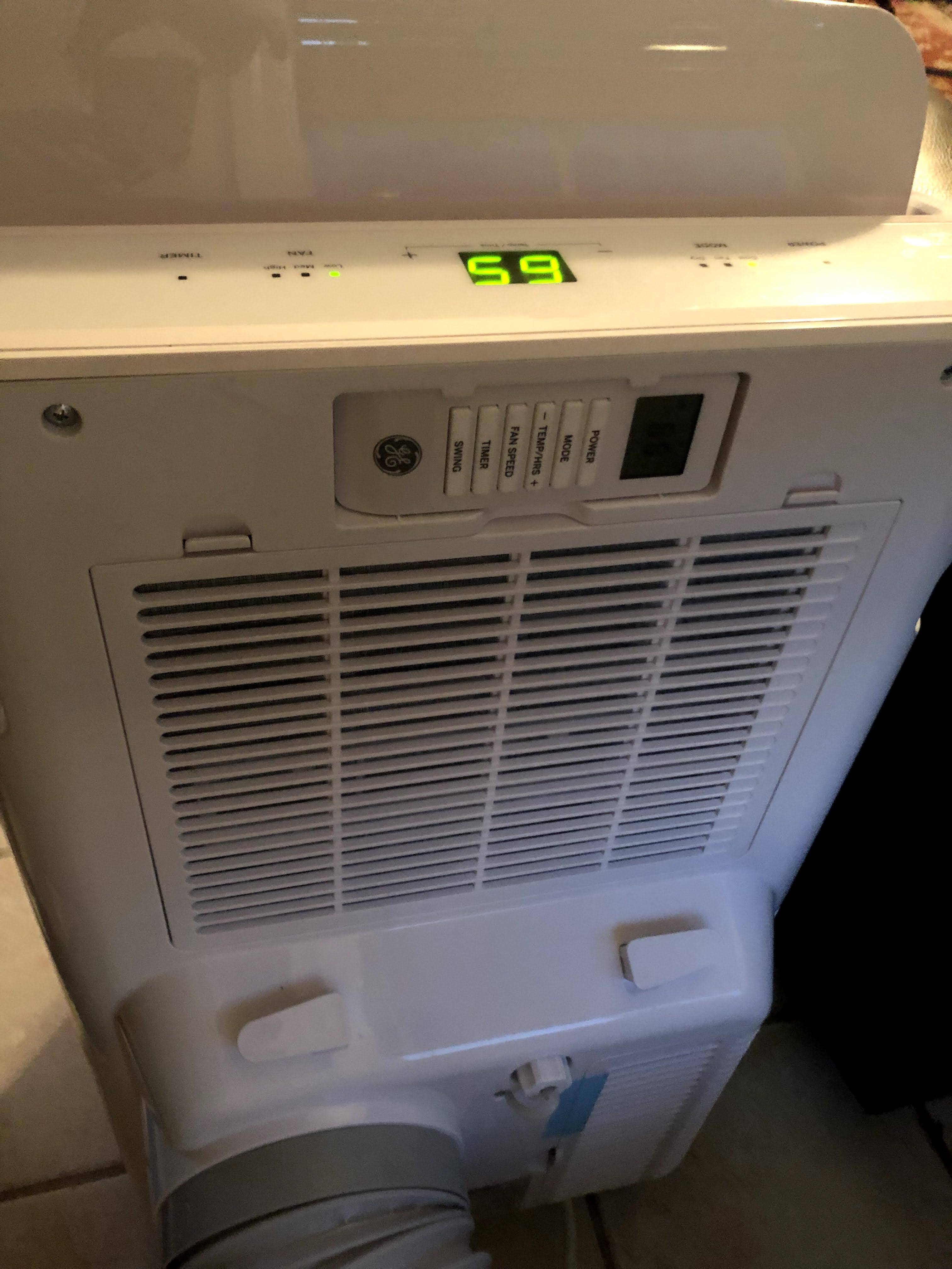 Back of unit. Remote storage and cord management., click to load a larger version