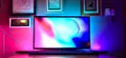Hue Play light bars on left and right sides of the screen, with Hue light strip center., click to load a larger version