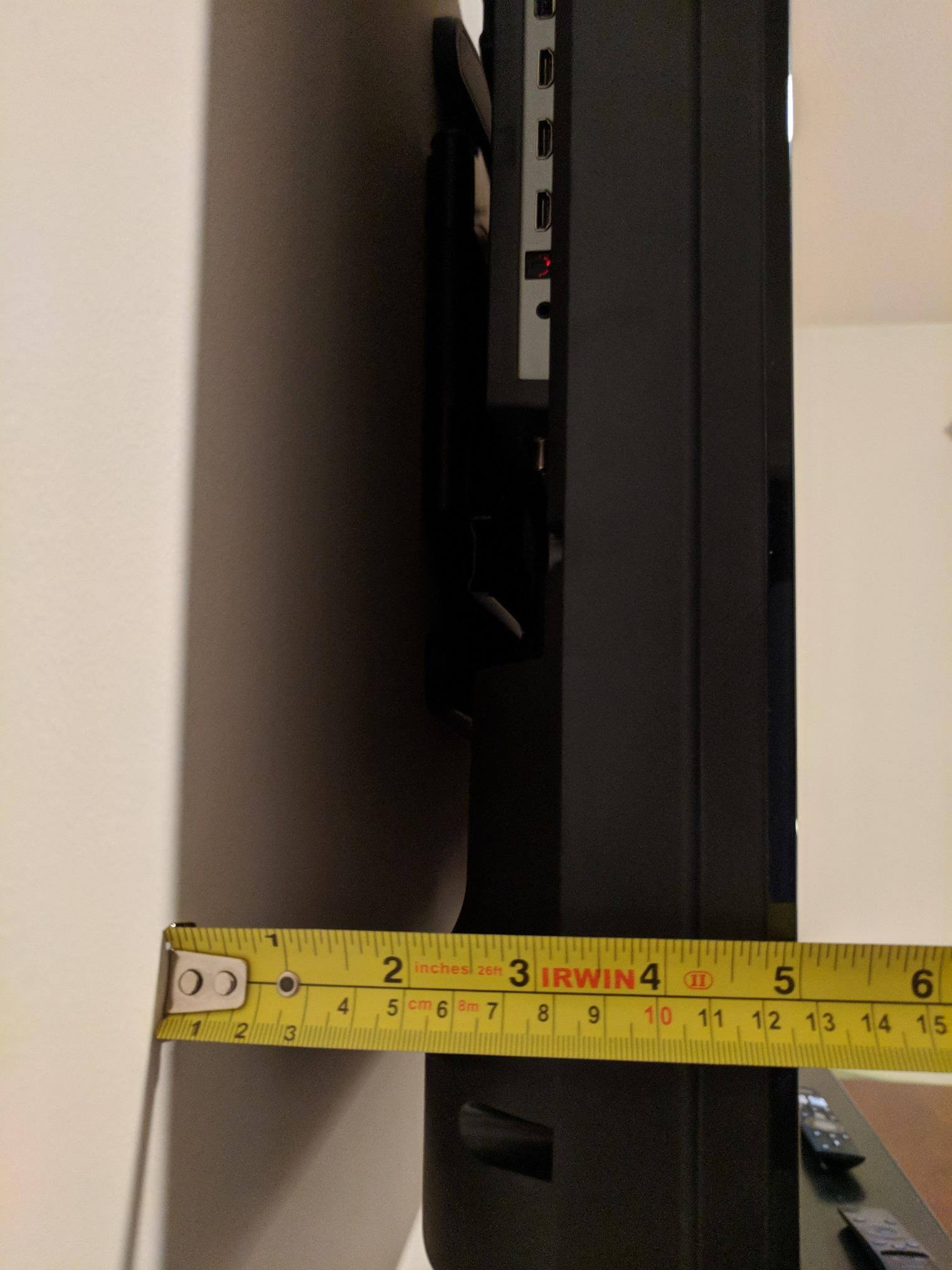 5 inches from wall (with wall mount), click to load a larger version