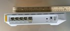 Back of Router with various ports and buttons, click to load a larger version