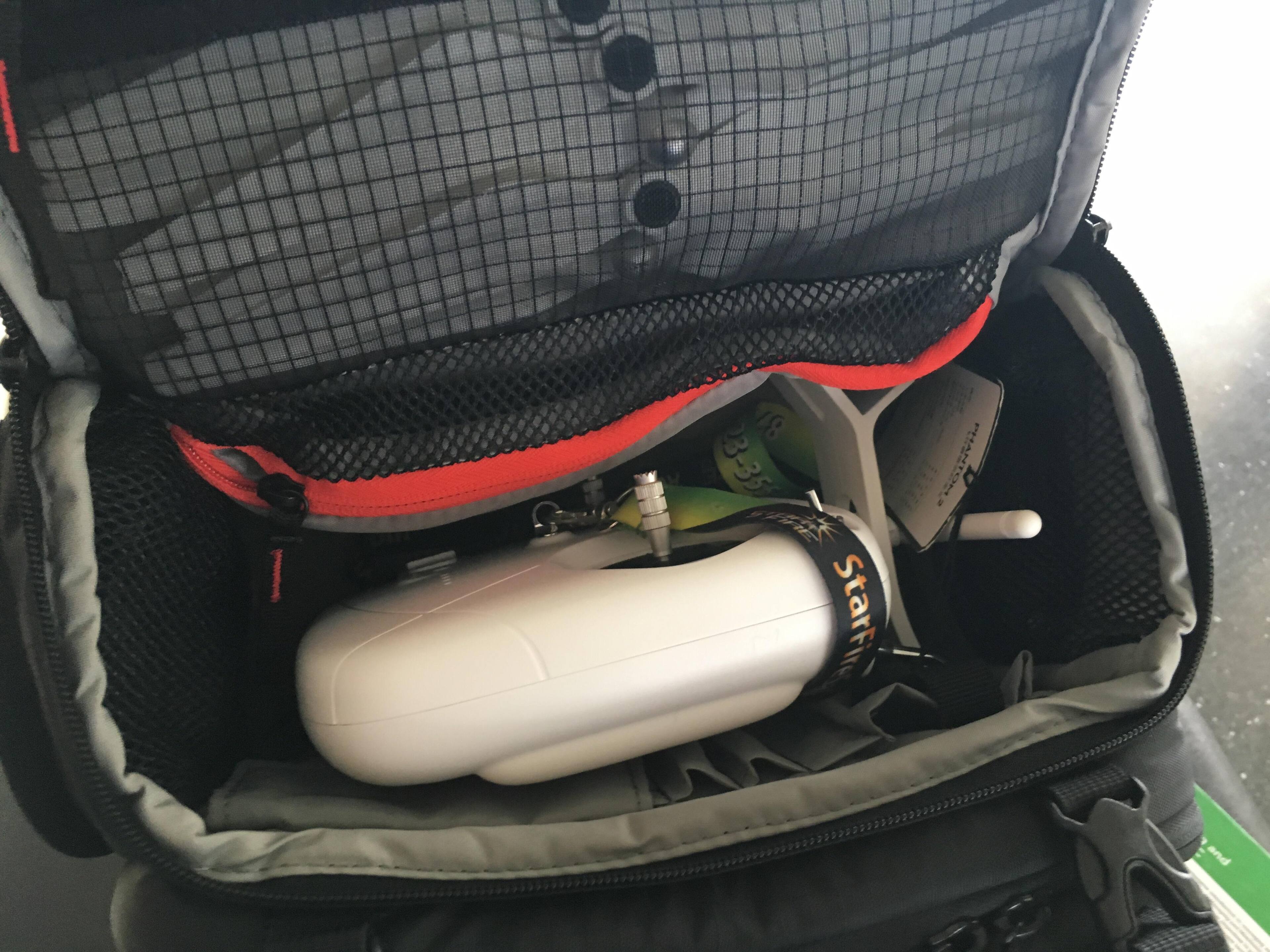 The top of the bag has room for cords, remote, (monitor if you are running a phantom 2 like I am), props, and other slots for stuff., click to load a larger version