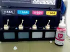 View of Ink Tanks Left 2 are full right 2 are empty, click to load a larger version