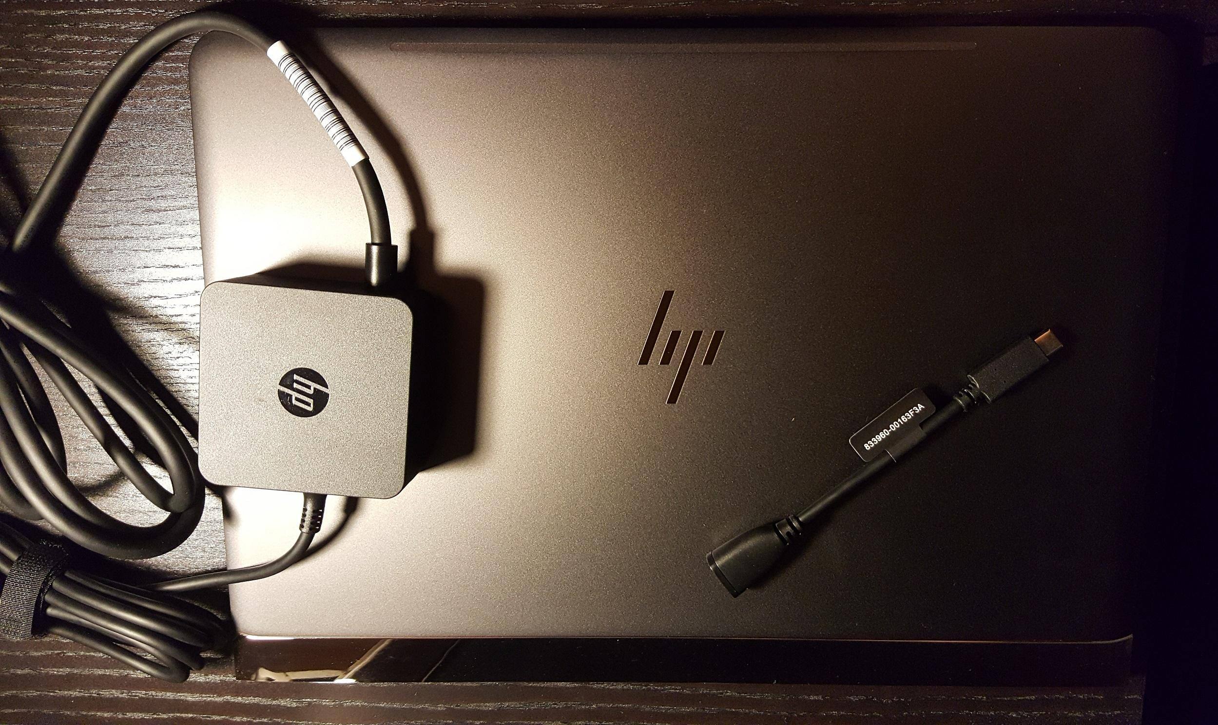 Laptop, charger, and USB-C adaptor, click to load a larger version