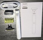 Groomer, blade, brush guard, blade cover, USB-A charging cable, and a great set of instructions, click to load a larger version