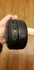 Taking it back to 2008 with a Micro USB connector for charging instead of more modern USB-C. Also showing the volume control wheel and adjacent mute button., click to load a larger version
