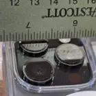 Raised lip around the rear camera lenses with clearance to protect them from resting directly on a flat surface, click to load a larger version