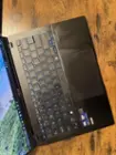 Ah, the competent keyboard is only marred by my skin oils.  Why can't we make a better black?, click to load a larger version