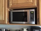 Best Buy: Oster 0.7 Cu. Ft. Compact Microwave Stainless-Steel OM0782BCF