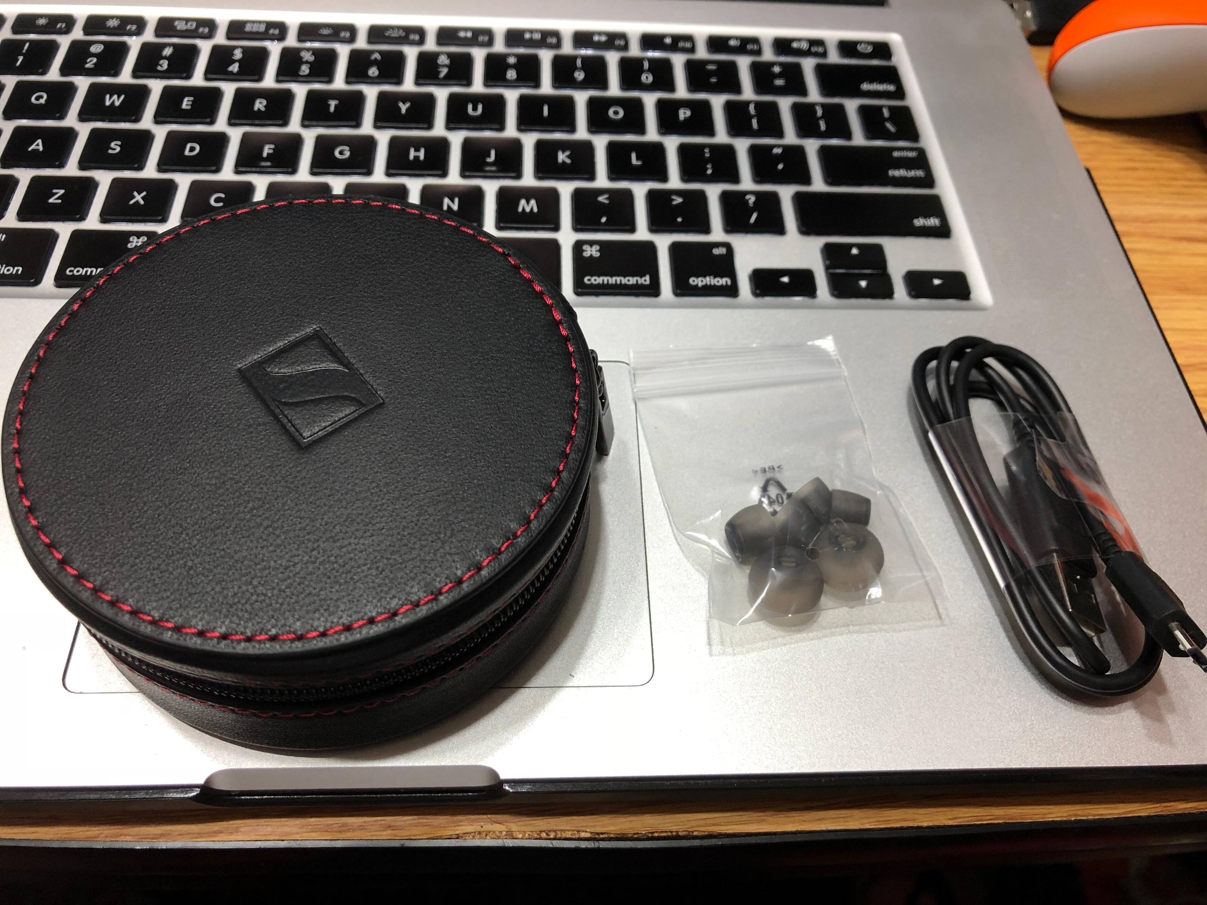 Case, eat adapters, charging cable., click to load a larger version