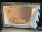 Best Buy: Oster 1.1 Cu. Ft. Mid-Size Microwave Stainless-Steel OM1101N0E