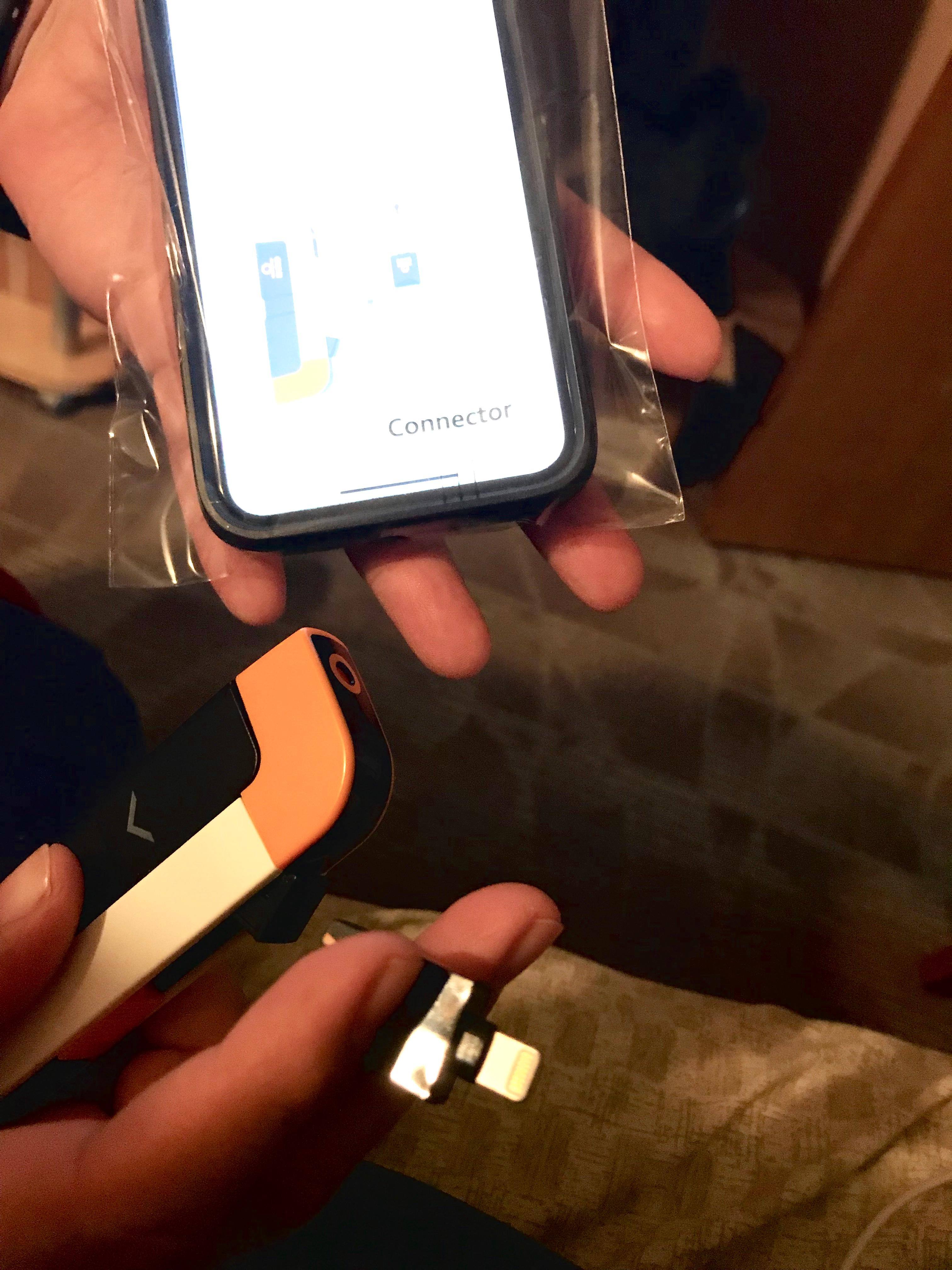 Phone in plastic bag., click to load a larger version