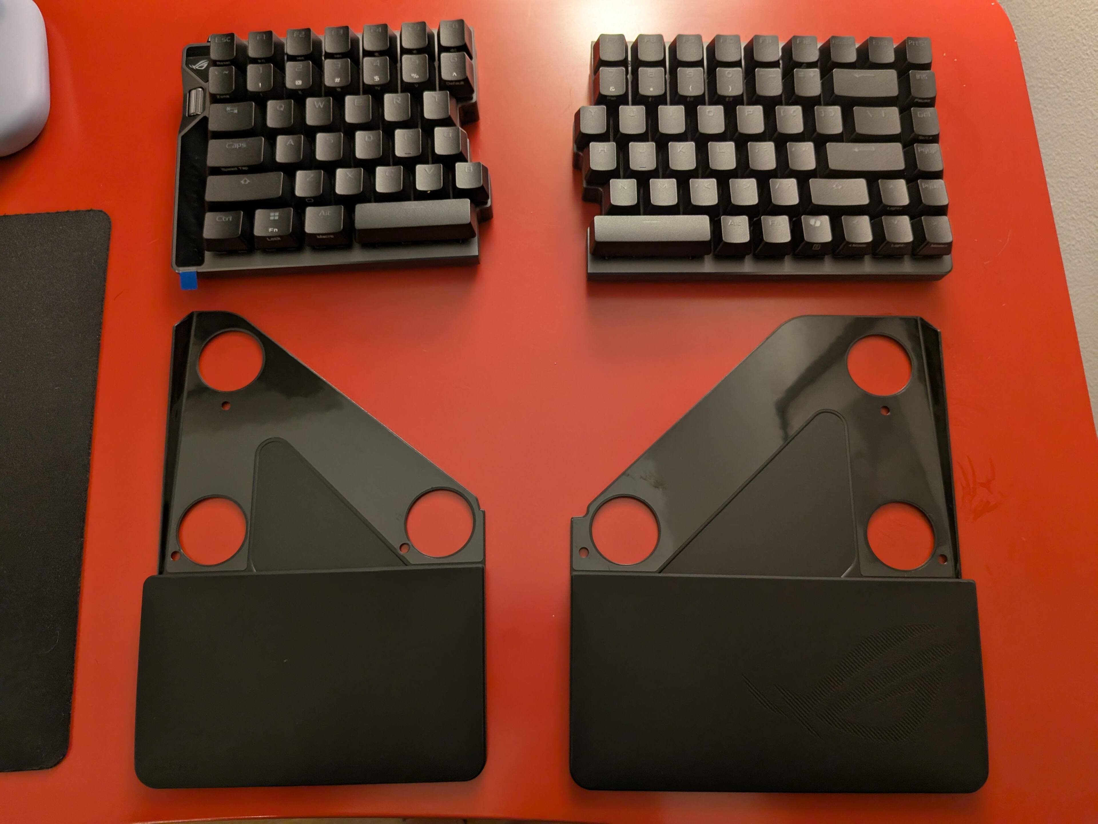 you have to drop the keyboard sections into the holes to connect to the wristrests, click to load a larger version