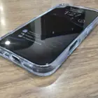 Side view of the case installed on the iPhone 16 Pro showing the cutouts for the charging port, speaker, mic, and camera slider, as well as covered side buttons, click to load a larger version