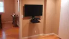 Floating tv, power outlet behind tv., click to load a larger version