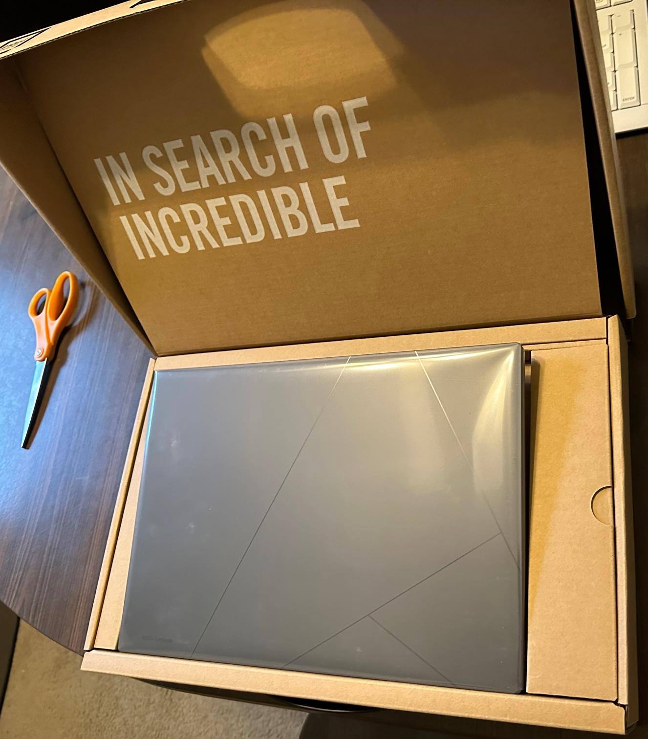 Laptop pops ups a little when opening box.  Nifty little touch., click to load a larger version