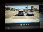 Same car but farther away, the plate is barely readable when zoomed in., click to load a larger version