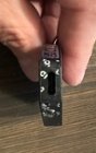 Tape residue remaining after removing security tape, click to load a larger version