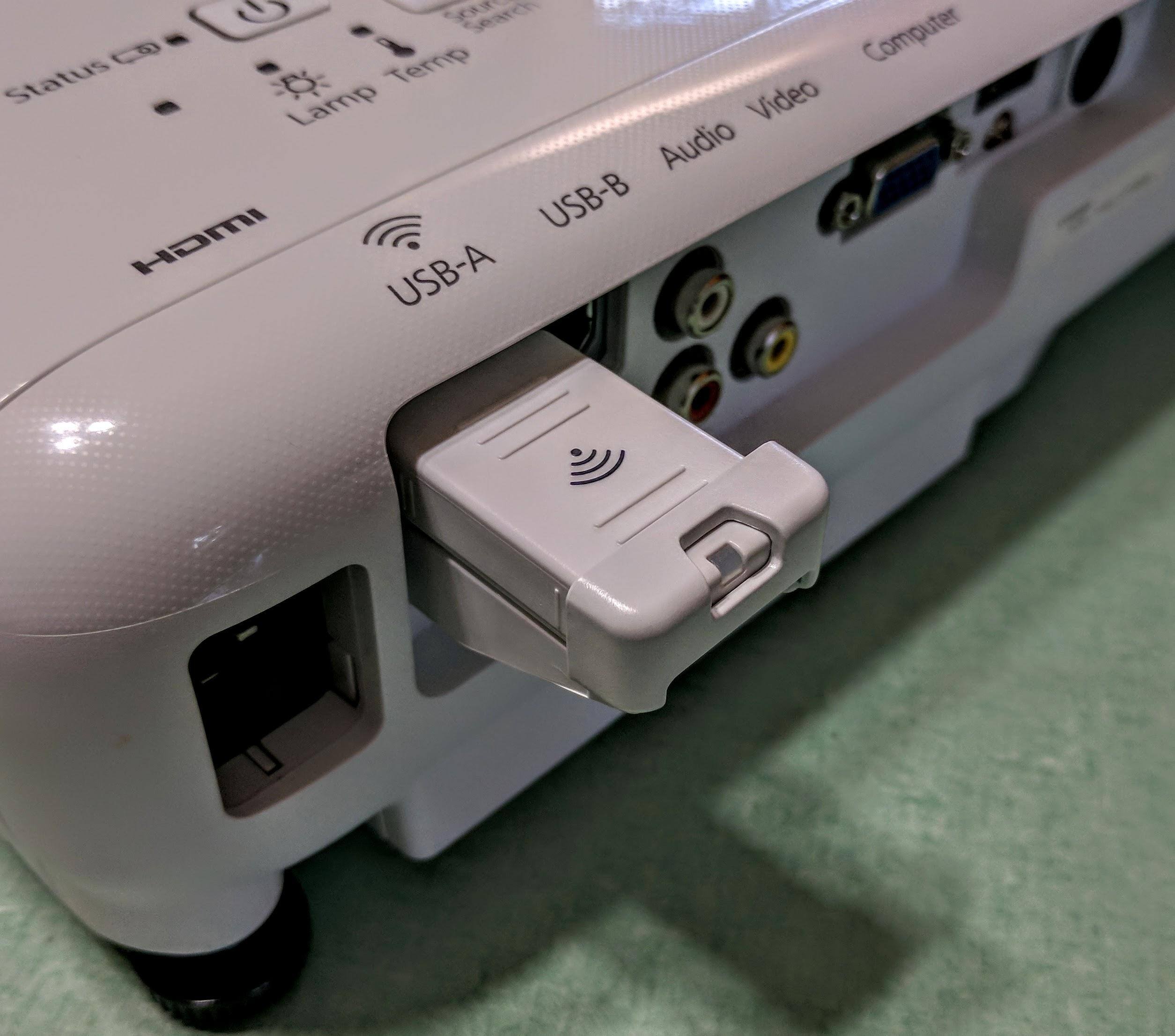 The high-speed LAN module for wireless connectivity should have been wired internally - adding it externally keeps the unit from being stored and carried with the wireless dongle installed., click to load a larger version