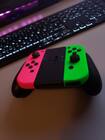 Nintendo Switch 115461BUND3 OLED Model With White Joy-Con™ With Joy-Con  (L/R) Wireless Controllers- Neon Pink/Neon Green