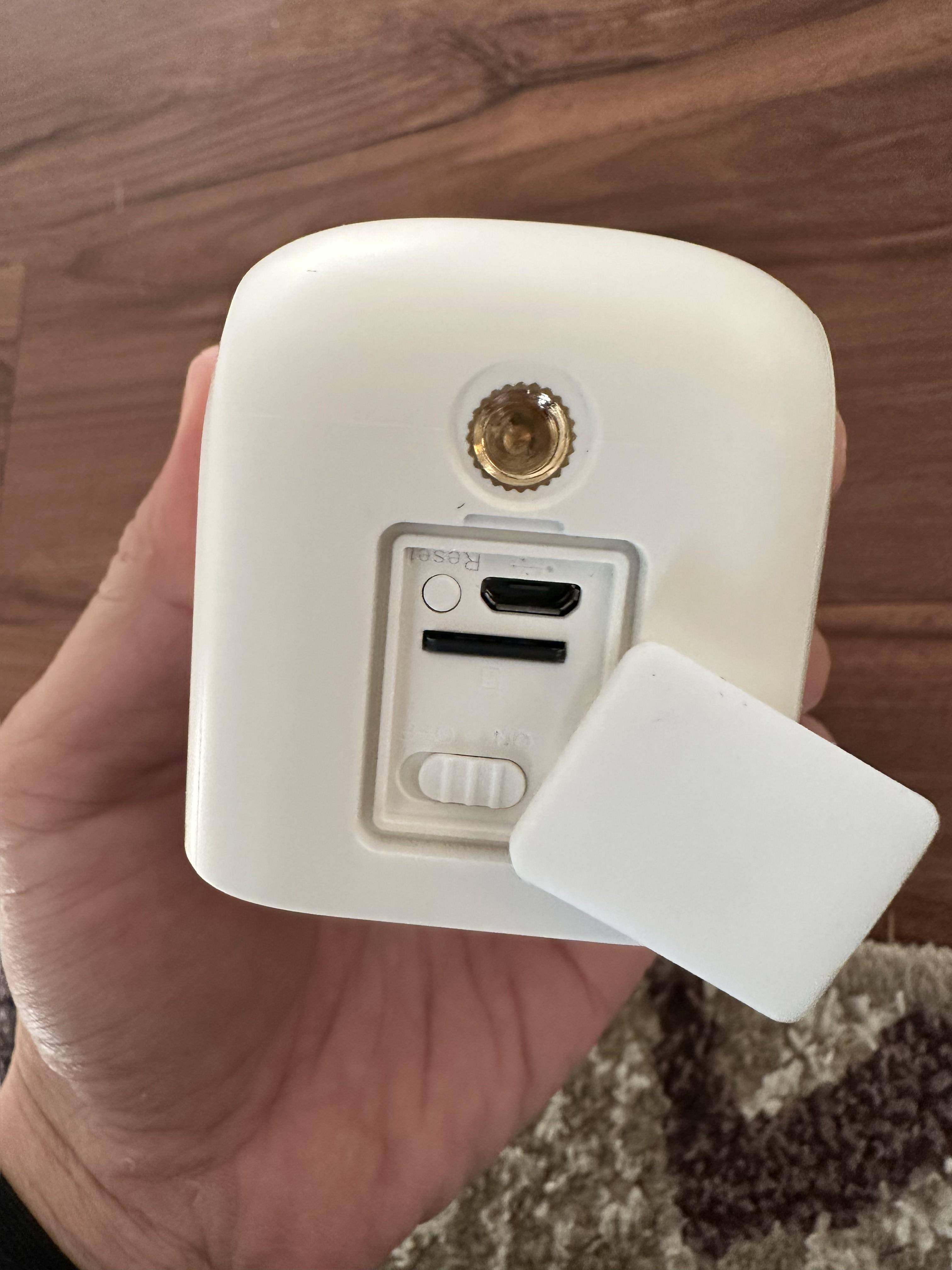 Rear with threaded mount, microUSB charge port, and microSD card slot, click to load a larger version