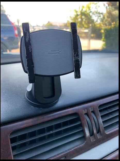 In less than 5 minutes, phone lost grip and slipped from strips, click to load a larger version