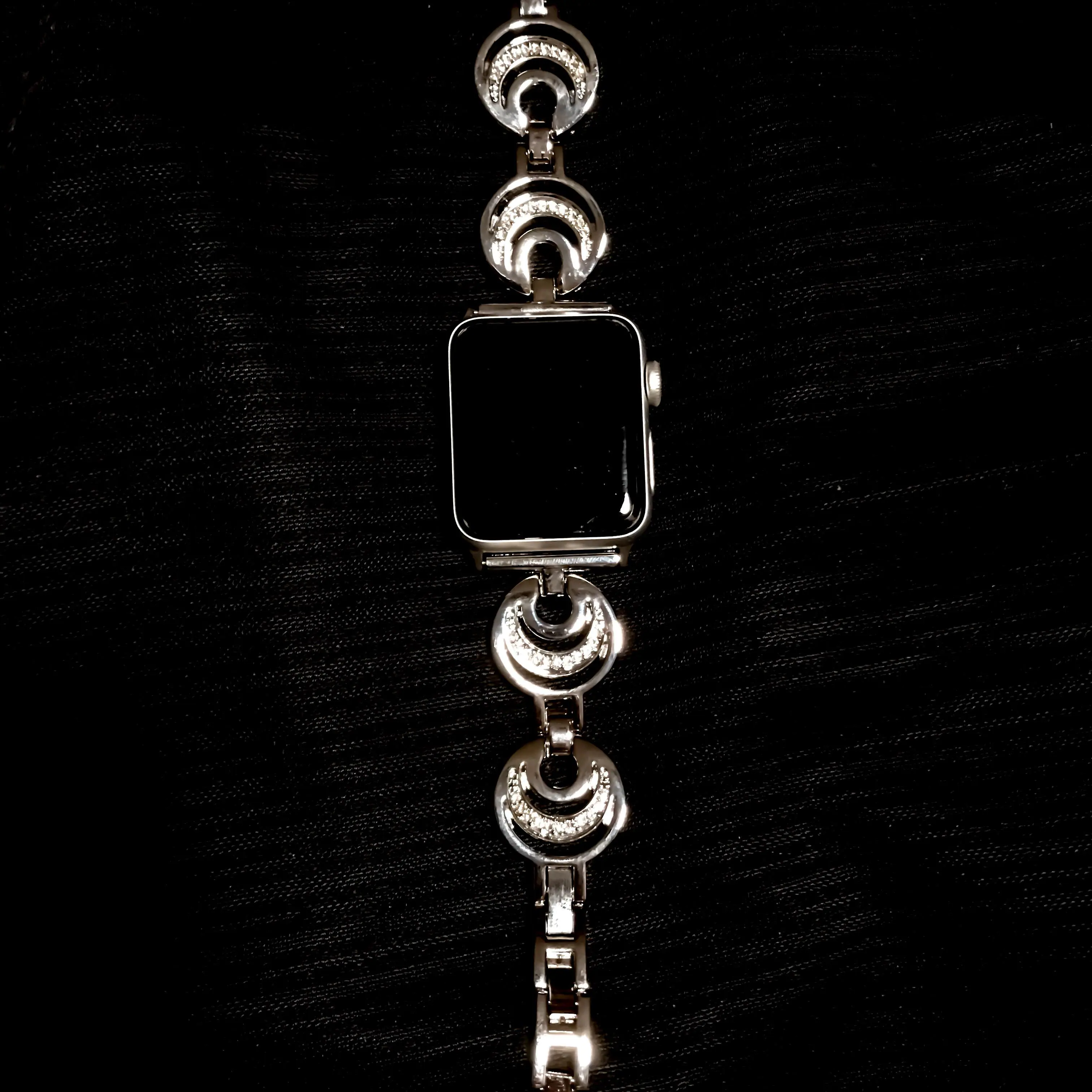 Watch band more conducive with feminine attire. Simple to swap with sports band for gym time., click to load a larger version