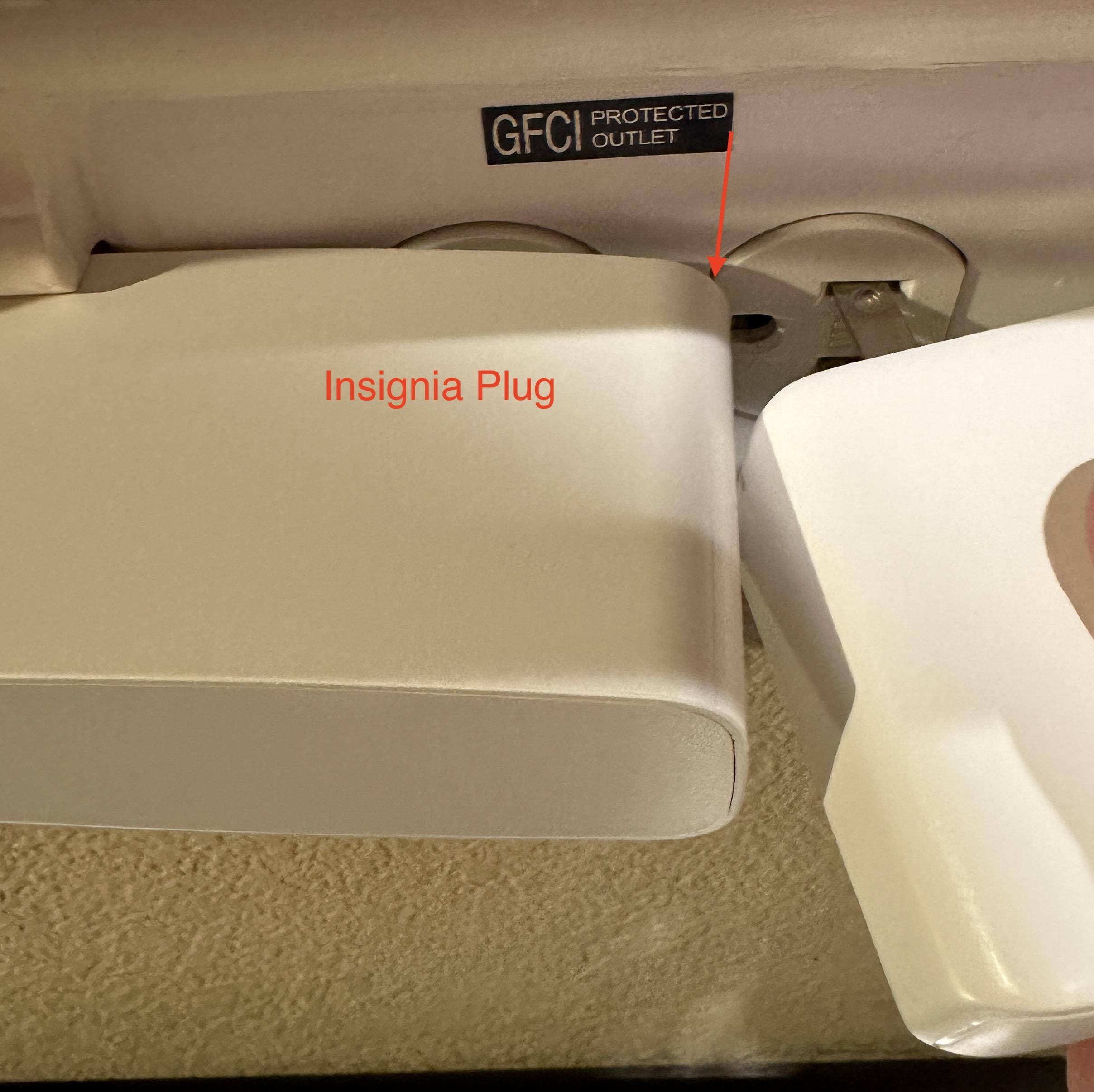The large plug prohibits another plug from plugging into the outlet., click to load a larger version
