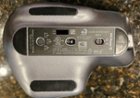 Bottom of mouse, on/off, button to switch between BT devices controlled, click to load a larger version