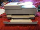 Front of printer with paper tray out, click to load a larger version