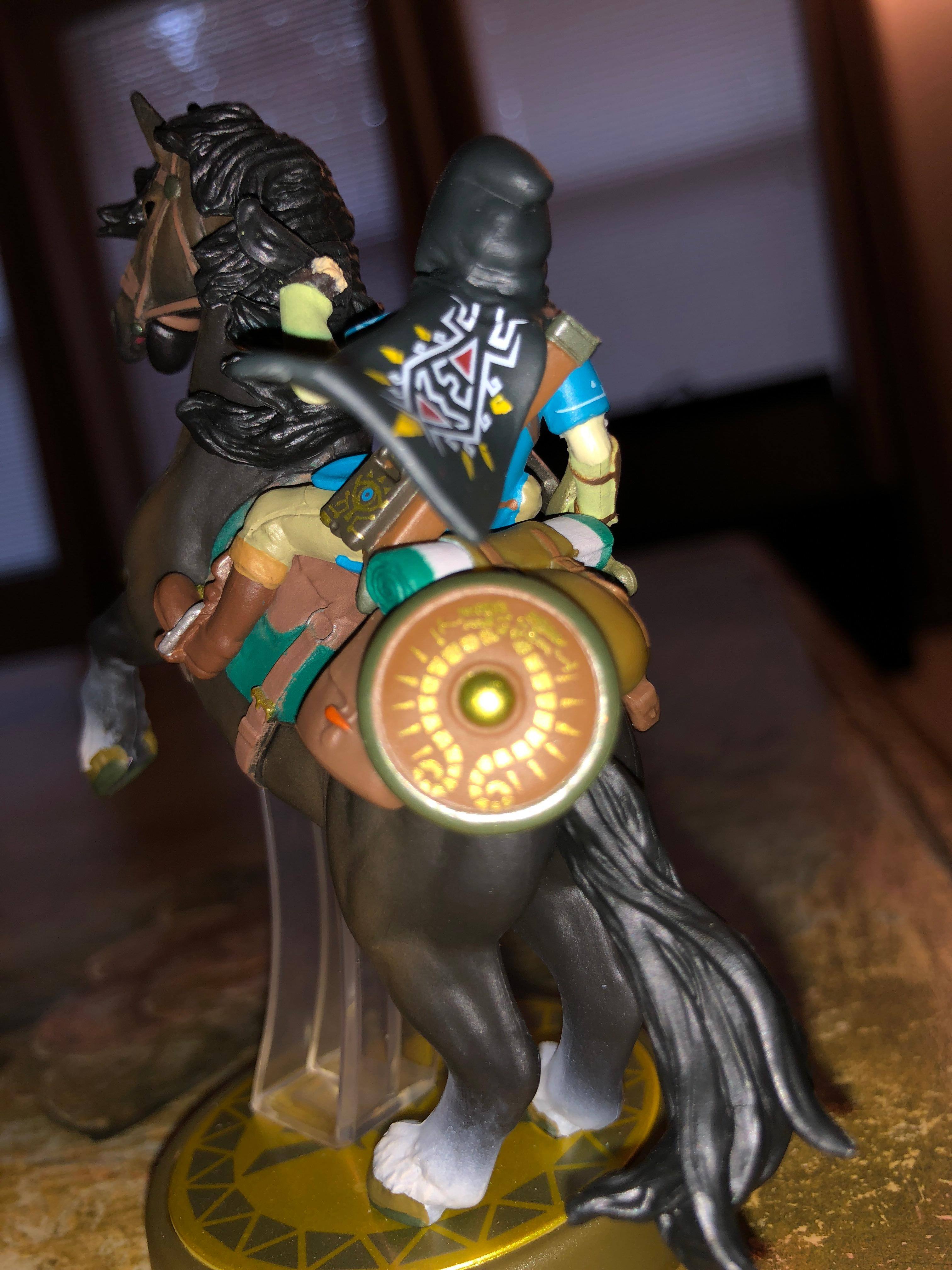 Behind, click to load a larger version