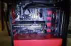 Inside of the case, showing no room to move the cooler and utilize the space and pass throughs for HD's, click to load a larger version
