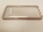 Clear/ White case with Redish/ Pink tint from shirt., click to load a larger version