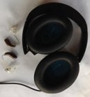 My BTE hearing aids that work fine with the QC 25s., click to load a larger version