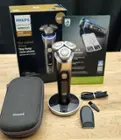 The Philips Norelco i9000 Prestige Ultra includes the Shaver, Flexible 3 blade head, Precision Trimmer, Charging Stand, Charging Cable, cleaning brush, and travel case., click to load a larger version