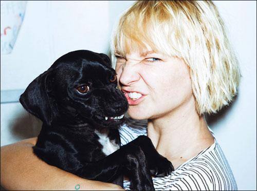 Sia and her dog, click to load a larger version