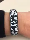 Design sticker peeling away from band, click to load a larger version