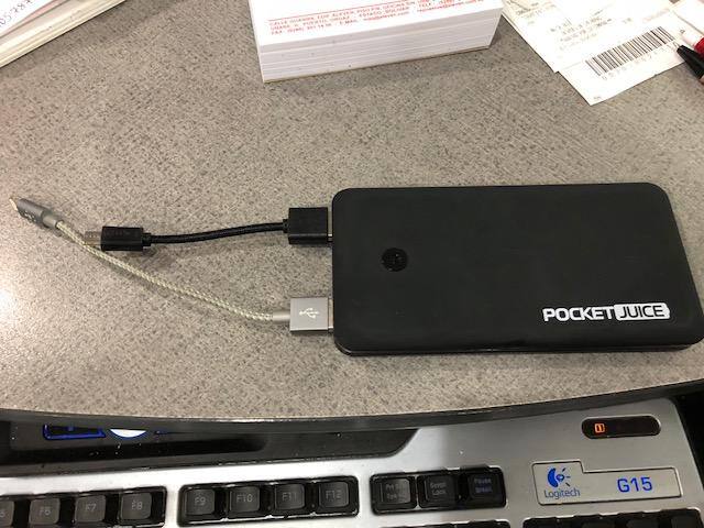 Pocket Juice shown with it's 2 ports, I use one for a iphone and another one to charge a headset with micro usb, cables are not included, only the one to charge the battery is included, click to load a larger version