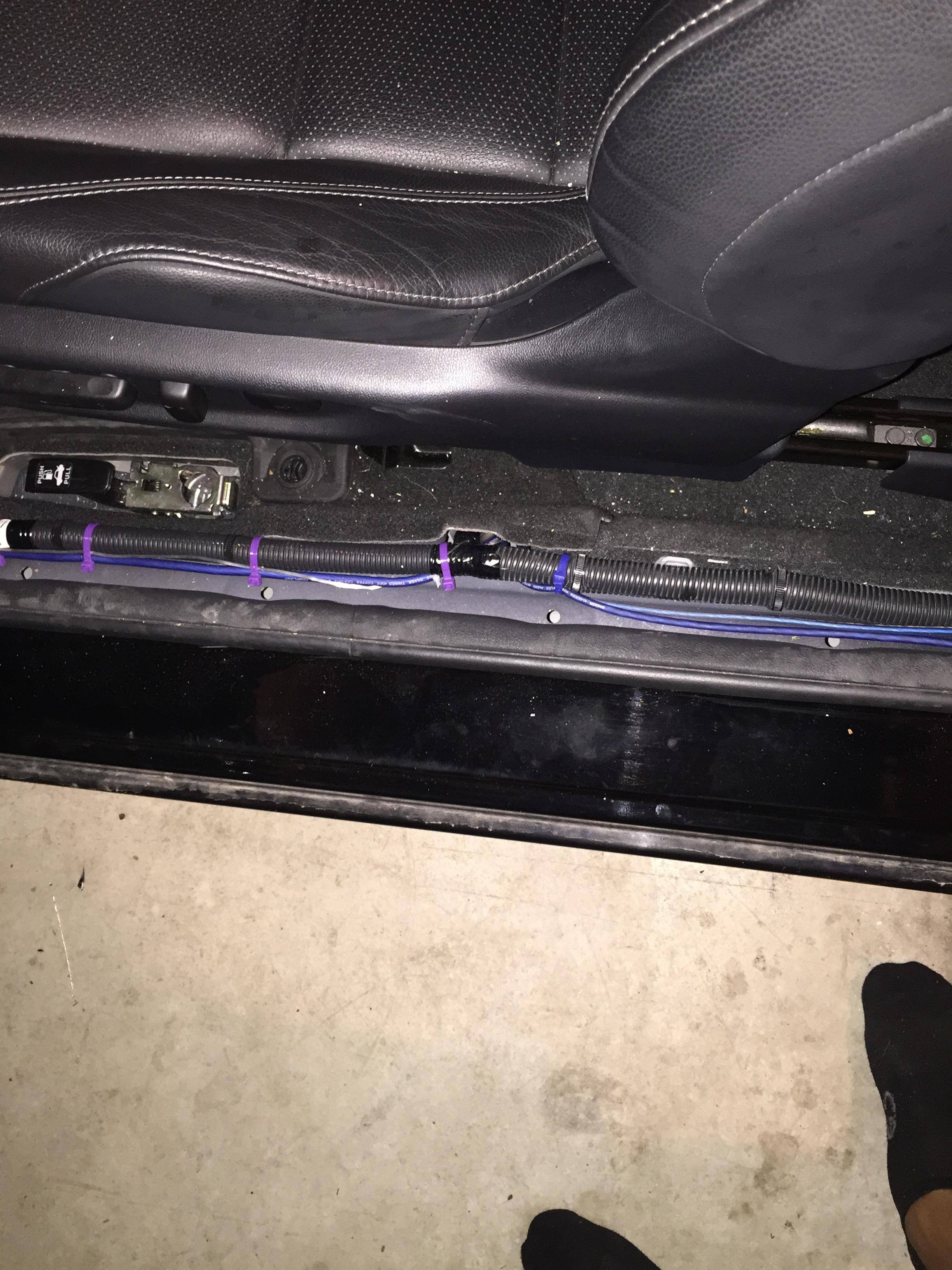 8 AWG Kicker Kit wired to amp under driver seat, click to load a larger version