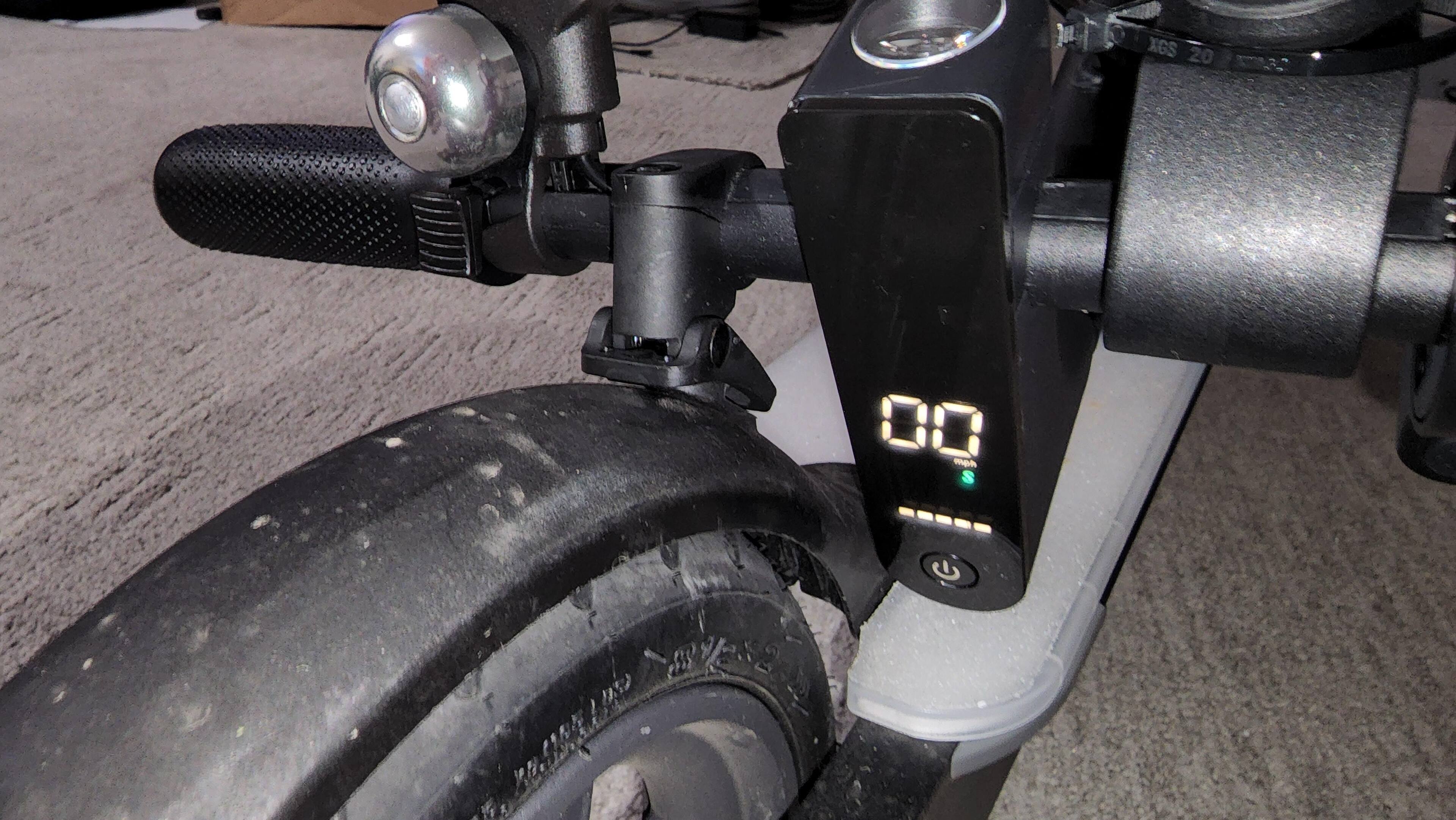 Weak plastic clip to secure the folded half to the wheel cover. Very poor choice in my opinion and I believe this will be one of the first things to break if the sun beats on the plastic. My guess is it will become brittle., click to load a larger version