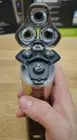 Daily cleaning is as easy as popping up the cutting head and cleaning out the hair around the moving heads and blades.  A monthly deep clean is recommended to extend the life of the blades with full blade replacement recommended every 2 years., click to load a larger version
