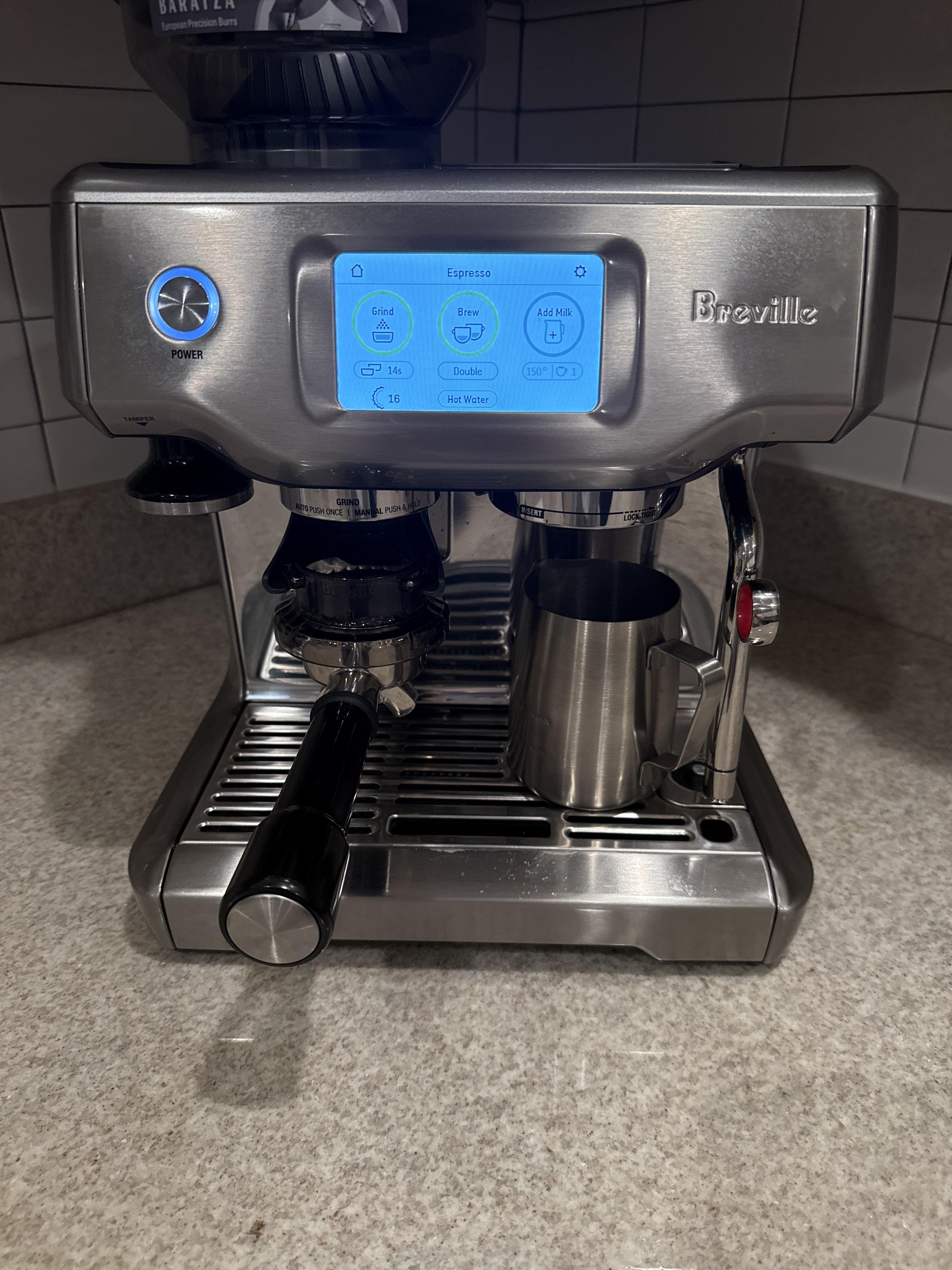 Breville Barista Touch from the front with the touchscreen, grinder and group visible