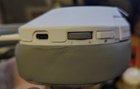 The left ear cup: USB-C charge port, volume slide wheel (It's clicky!), and the mute button. Volume wheel clicks in for EQ preset changes., click to load a larger version