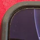 View of the corner of the screen protector and the gap between it and my phone's case, click to load a larger version