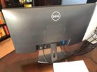 Love the smooth back (with covered for unused VESA mount). Notice that the monitor is more of a darkgray/graphite color rather than a true black., click to load a larger version