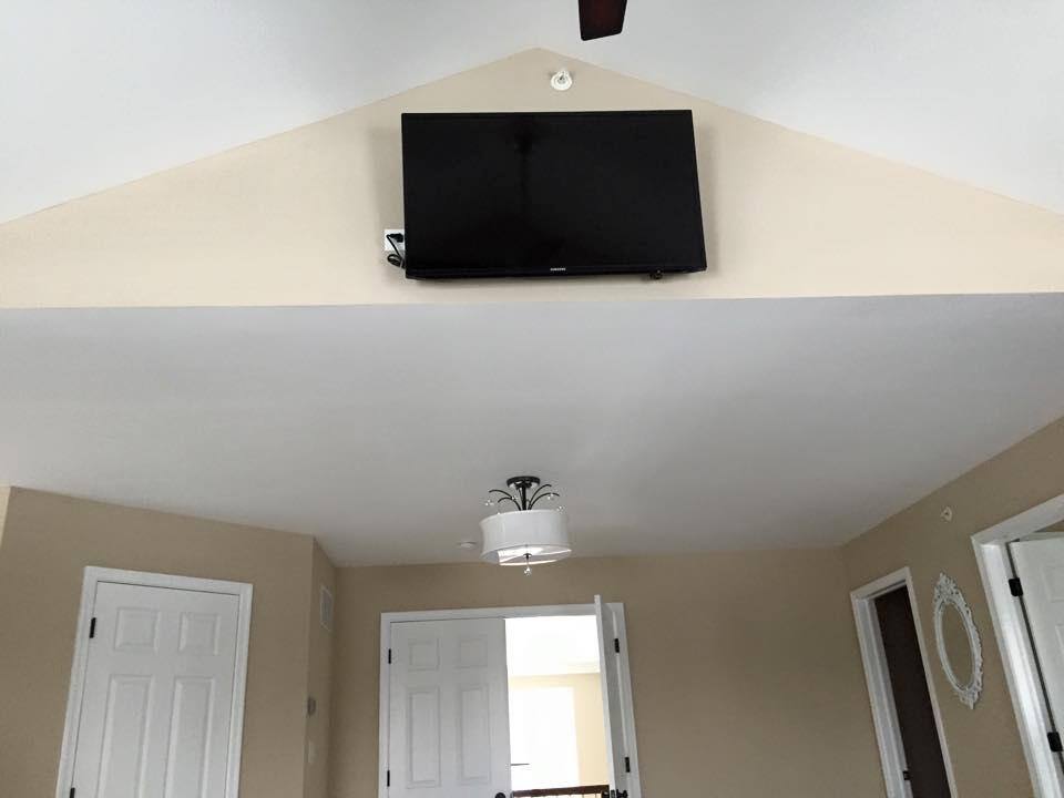 TV Mounted in bedroom., click to load a larger version